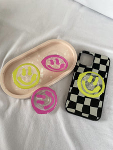 Painted Smiley Phone Grips