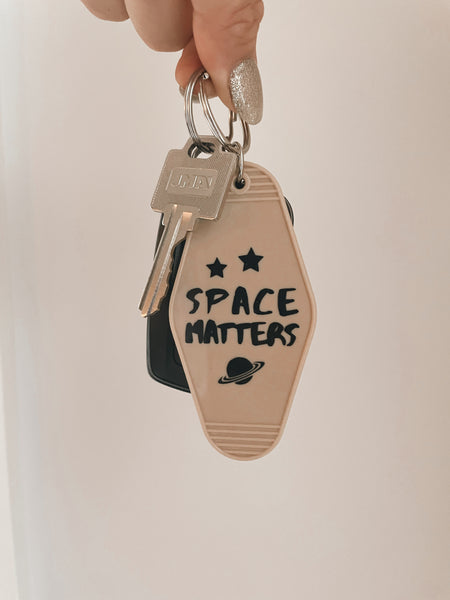Space Matters Motel Keychain